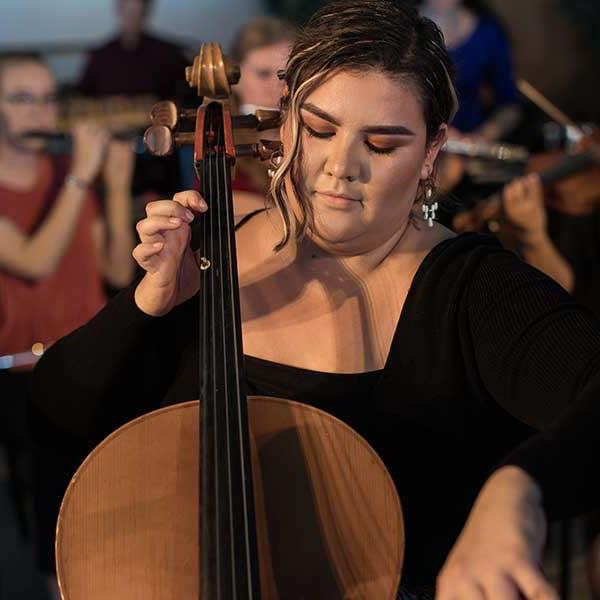 Female student playing the cello